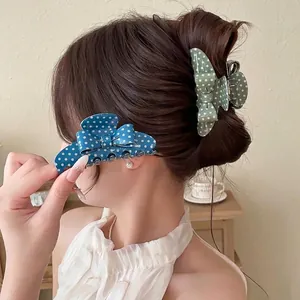 Elegant acrylic polka dot bow hair claw clip for women's stylish updo hairstyles