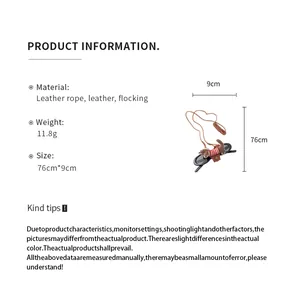 Detailed product specifications and dimensions for dog-shaped eyewear clip necklace