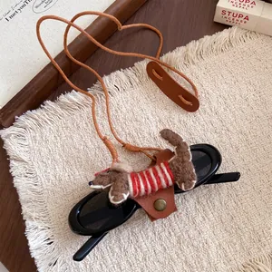 Macro detail of cute flocked dog eyeglass holder necklace featuring leather cord and snap clip