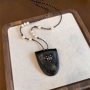 Korean style black polka dot heart pendant necklace with elegant white pearl accents