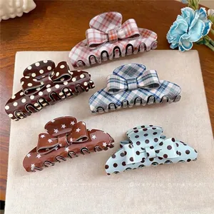 Vintage acrylic bow hair claw clips with polka dot, star and plaid patterns set