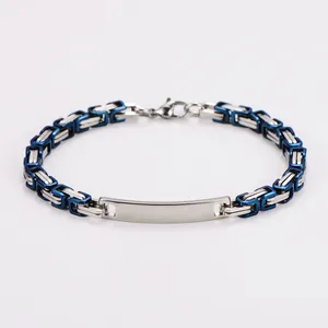 Close-up of Byzantine stainless steel bracelet with blue and silver links and ID plate