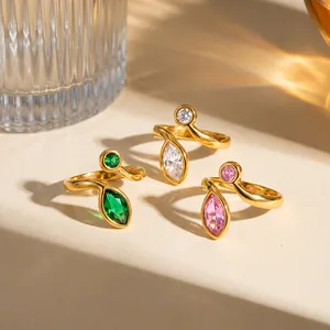 Detail view of 18k gold plated stainless steel rings with colorful marquise zircons