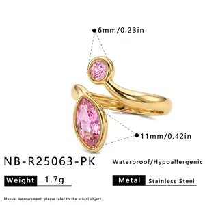 Detail view of 18k gold plated stainless steel ring with pink marquise zircon stone
