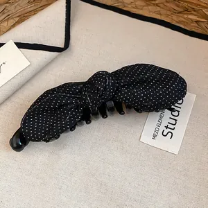 Fermaglio per capelli a fiocco in tessuto a pois vintage con clip a banana in nero