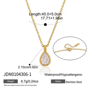 Detail view of a gold pear-shaped crystal necklace with measurements and specifications.