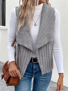 Detailed macro view of a stylish grey faux shearling vest featuring unique ribbed texture