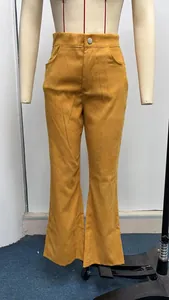 Front view detail of mustard yellow corduroy high-waisted flare pants on a mannequin