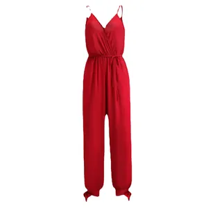 Elegant red V-neck spaghetti strap jumpsuit with waist tie and tapered leg ties