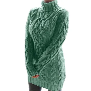 Detalle del tejido de ochos grueso de un vestido de punto vintage verde salvia