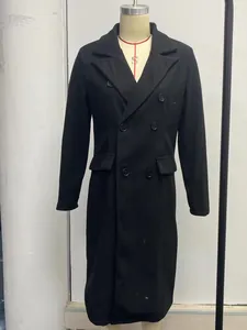 Classic elegant long black double-breasted woolen coat for women with functional flap pockets