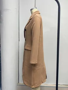 Elegant camel double-breasted long wool coat for women featuring functional side pockets
