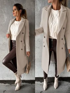 Detailed view of women's beige double-breasted wool coat with cable-knit sweater