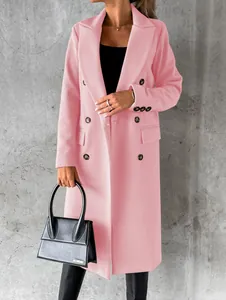 Close-up detail of a pink double-breasted long sleeve wool coat with flap pockets
