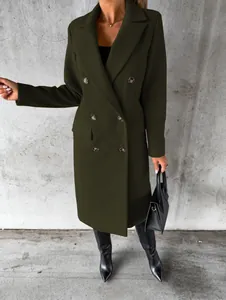 Detail view of an olive green double-breasted wool coat featuring classic pockets.