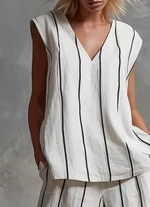 Franse minimalistische linnen tweedelige set met zwart-witte strepen en wijde broek
