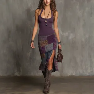 Fashionable model wearing a purple halter top and patchwork midi skirt with cowboy boots.