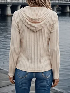 Detailed back view of a stylish cream ribbed knit hooded long sleeve top for women