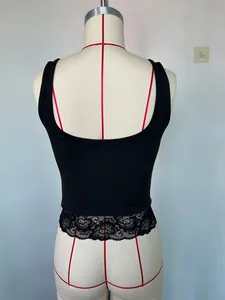 Back view detail of a black crop top featuring delicate floral lace trim on the hem.