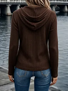 Back view of brown ribbed long-sleeve hoodie showing hood detail and slim fit style.