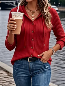 Fashionable red ribbed long-sleeve button-down hoodie for women in outdoor setting