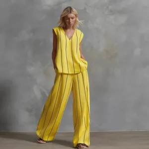 Stijlvolle linnen dames set met gele verticale strepen mouwloze top en wijde pijpen broek