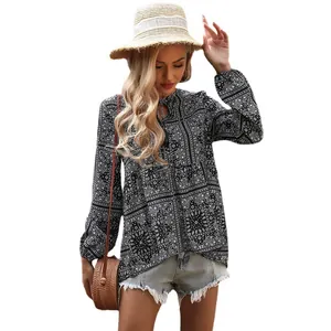 Bohemian vintage V-neck printed blouse with tassel detail and long sleeves for women