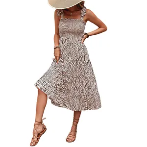 Robe d'été mi-longue à imprimé léopard tendance avec bretelles à nouer et volants chic