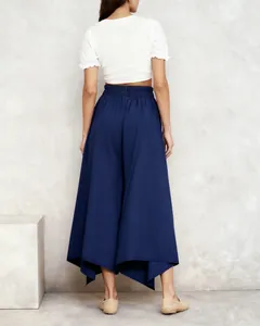 Back view of women's navy blue high-waisted culottes with unique asymmetrical hem design