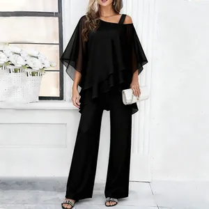 Elegant black two-piece set featuring tiered off-shoulder top and matching wide-leg pants