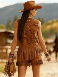 Back view of a boho-style brown suede vest with intricate hollow patterns and fringe