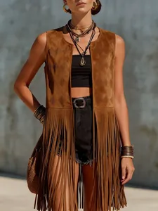 Close-up of bohemian style women's brown suede vest featuring long decorative fringe