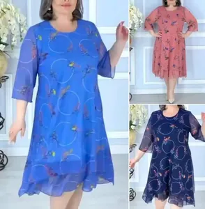 Elegant women's floral print chiffon dress featuring a layered asymmetric hemline