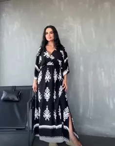 Elegant black maxi dress with white ethnic prints and side slit detail for women