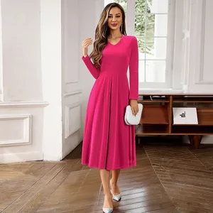 Elegant fuchsia long-sleeved velvet pleated midi dress for elegant formal occasions