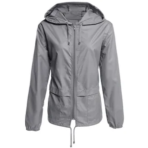 Detail view of a grey lightweight hooded windbreaker with zip closure