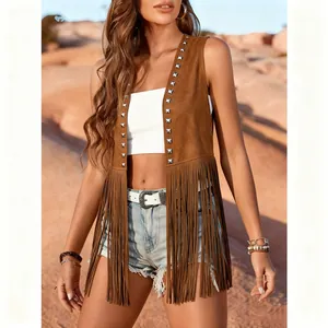 Detailed view of women's vintage brown fringe vest with silver studs in desert setting