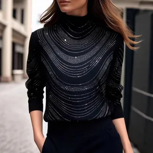 Elegantes schwarzes Damen-Langarmshirt mit funkelnden Strasssteinen im Wellen-Design.