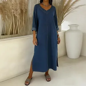 Detail of V-neck casual loose blue imitation denim dress with side slit