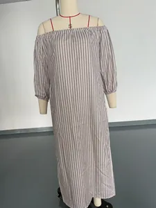 Elegant off-the-shoulder vertical striped long sleeve maxi dress displayed on a mannequin