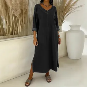 Detailed view of dark grey casual loose V-neck faux denim dress featuring side slits