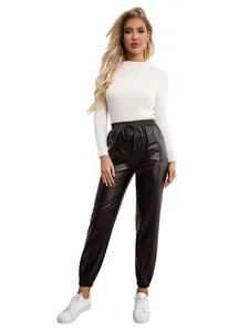 Full length view of black PU leather joggers with elastic drawstring waist and ribbed cuffs.