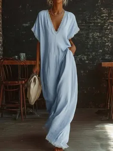 Elegant light blue loose cotton linen maxi dress with delicate white lace trim details.
