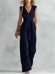 Elegante tuta blu scuro senza maniche con scollo a V, cintura in vita e gamba larga
