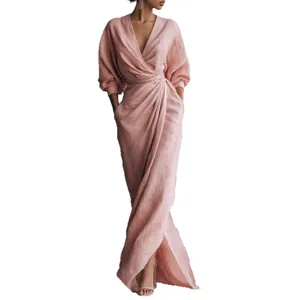 Elegant pink V-neck maxi wrap dress with long sleeves for resort and summer wear