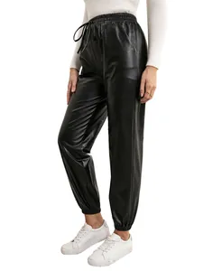 Detail view of women's black faux leather joggers with drawstring elastic waist