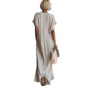 Elegant loose linen maxi dress with lace trim, perfect bohemian style for summer comfort