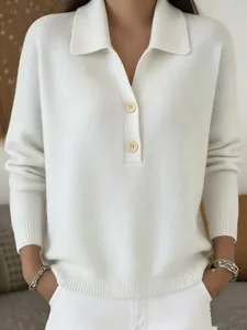 Macro view showing the detailed texture of a white long-sleeve ribbed polo sweater