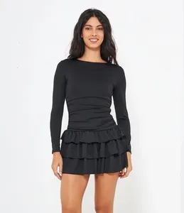 Elegant slim fit black long sleeve dress featuring a stylish tiered ruffled skirt design.