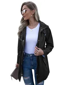 Detail of a women's black hooded mid-length zipper raincoat jacket